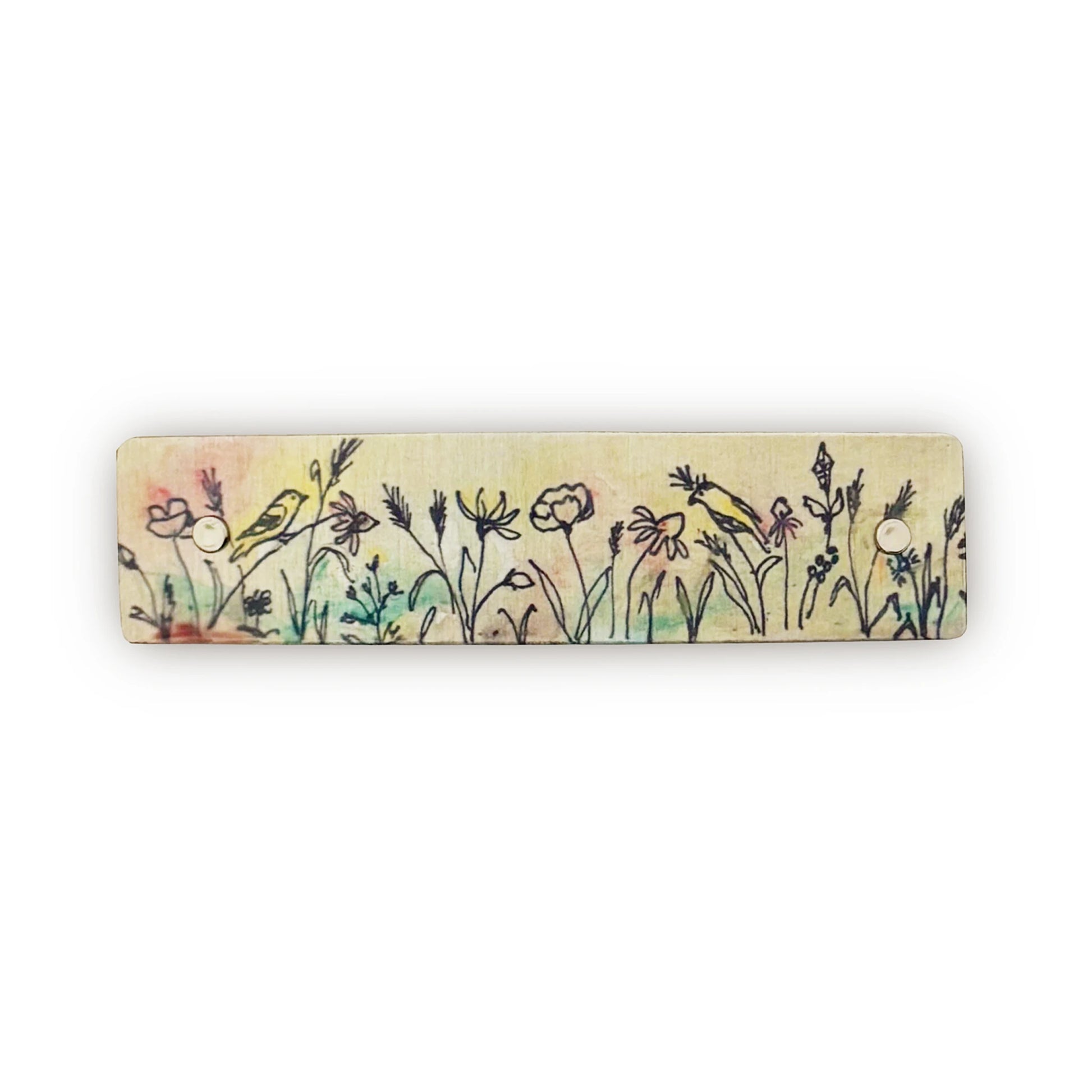 A boutique hair barrette featuring a hand-drawn style illustration of wildflowers and two small birds in soft pastel colors on a light beige background, shown against a plain white backdrop.