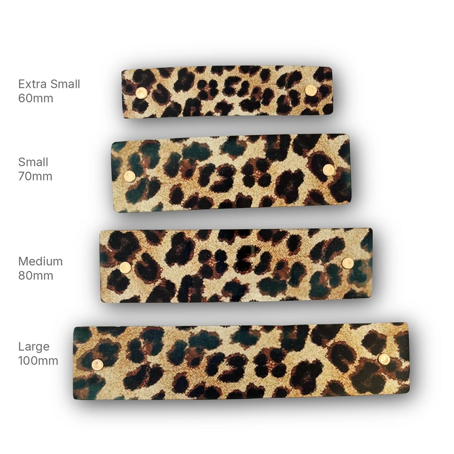 Four leopard-print French barrette sizes labeled Extra Small 60mm, Small 70mm, Medium 80mm, and Large 100mm on a white background.