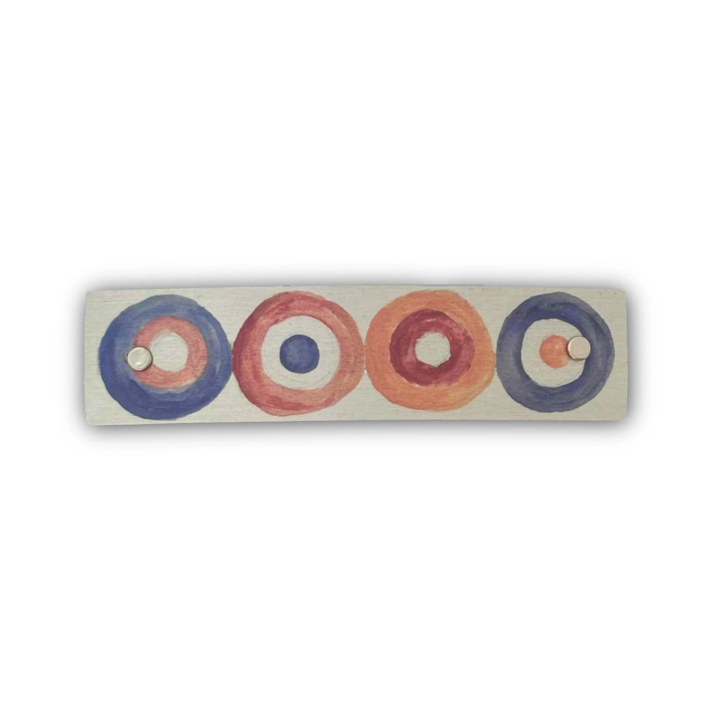 Handmade earth tone hair clip made of metal.