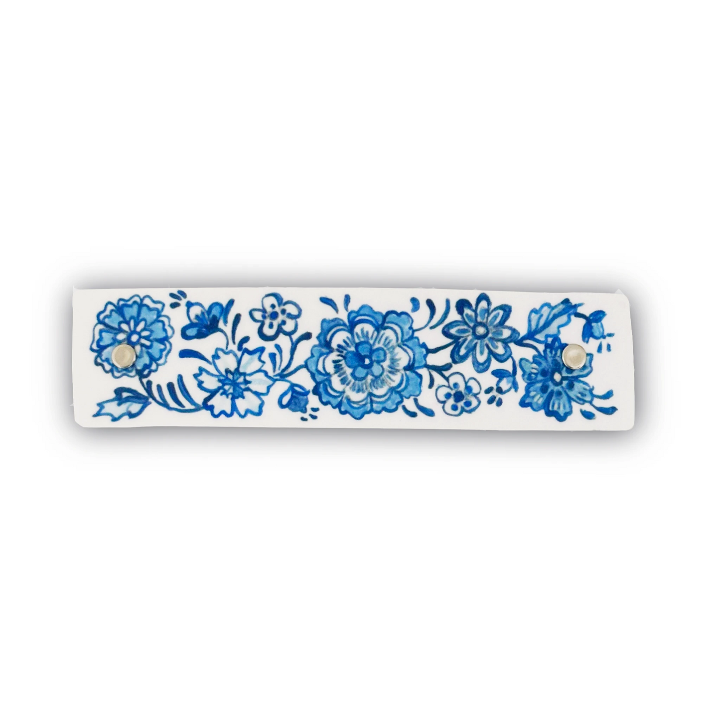Delftware-inspired original artwork by Robbin V. Davis, featured on a handmade hair barrette for women.