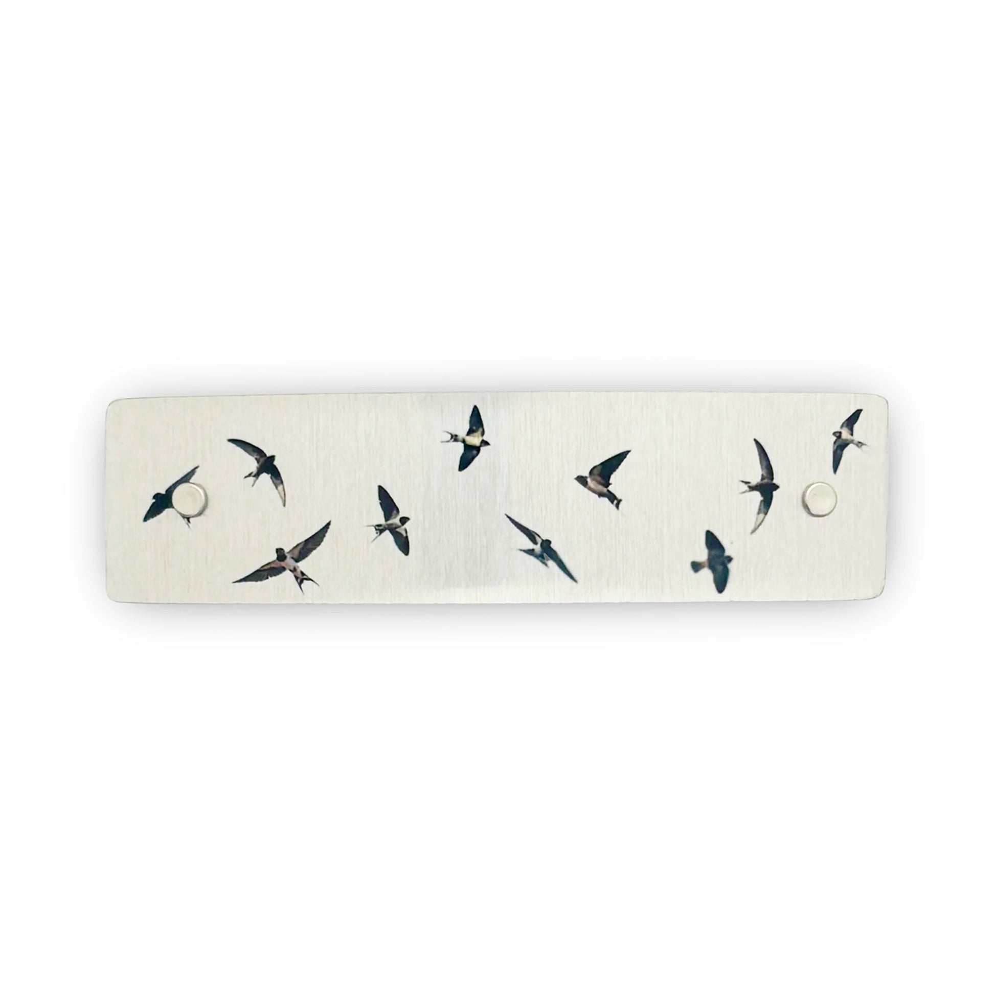 Silver metal boutique hair clip decorated with flying swallows.
