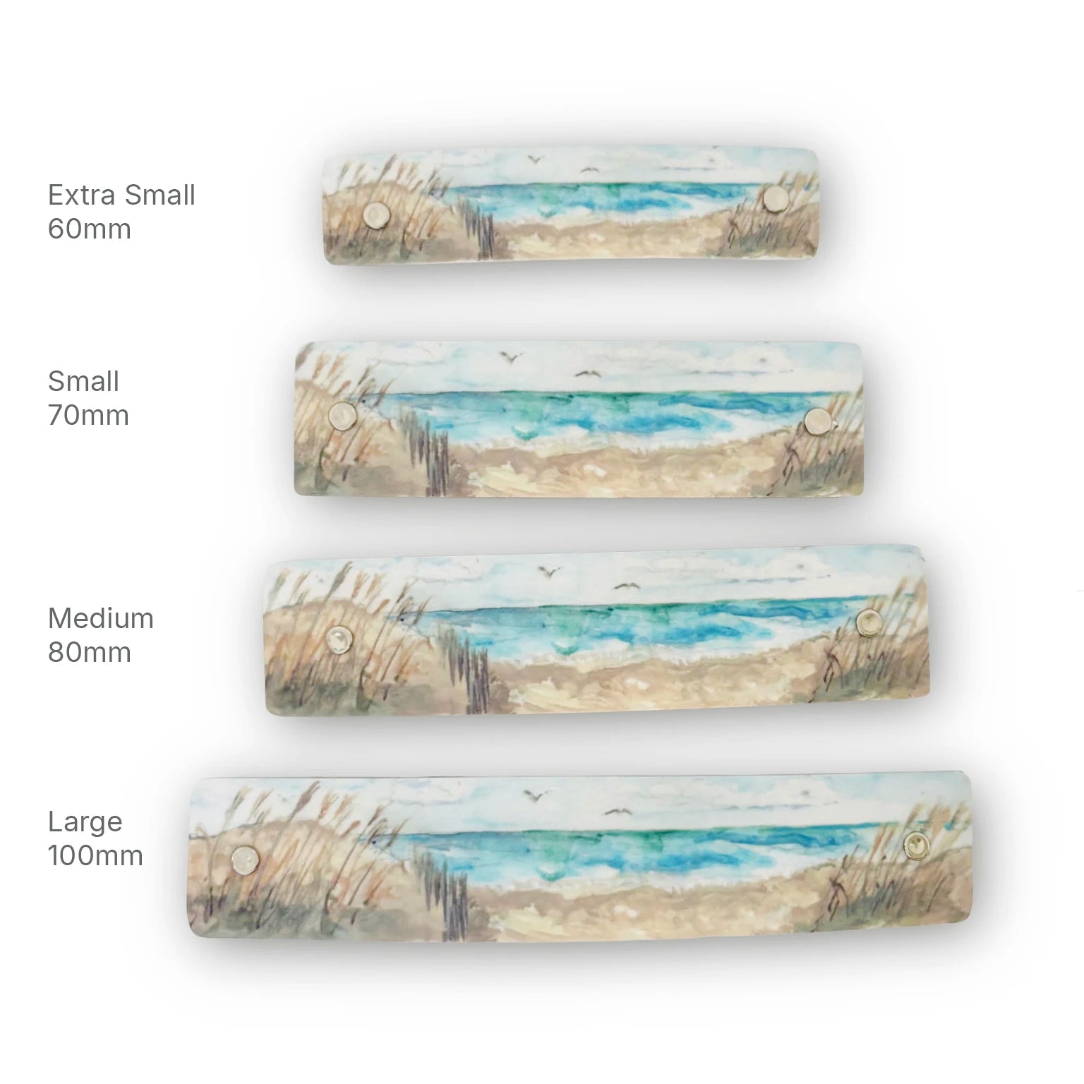 Four rectangular beach-themed French barrette hair clips shown in four sizes labeled Extra Small 60mm, Small 70mm, Medium 80mm, and Large 100mm on a white background.