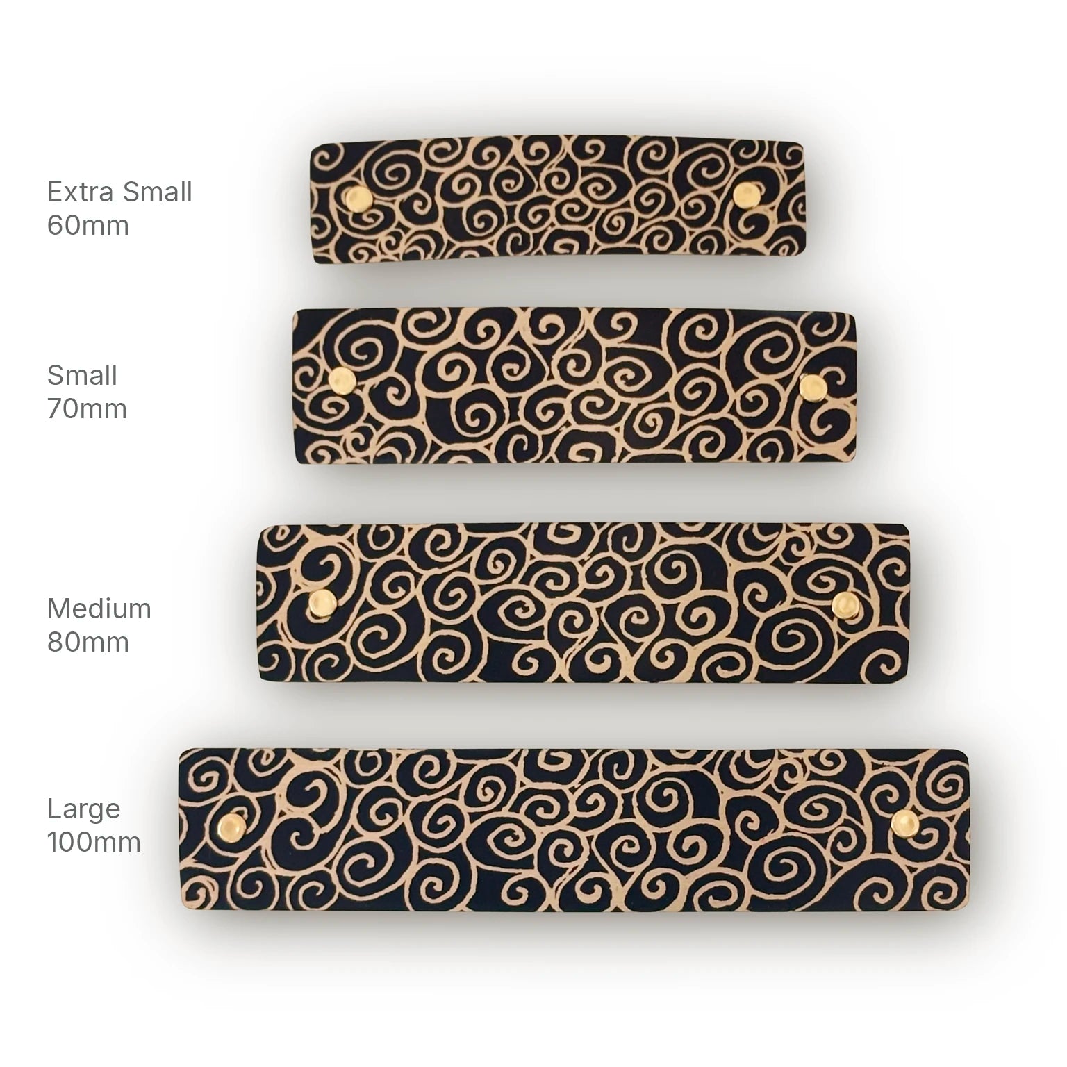 Four rectangular black iFrench barrettes with gold swirling scroll patterns shown in four sizes, labeled Extra Small 60mm, Small 70mm, Medium 80mm, and Large 100mm, on a white background.