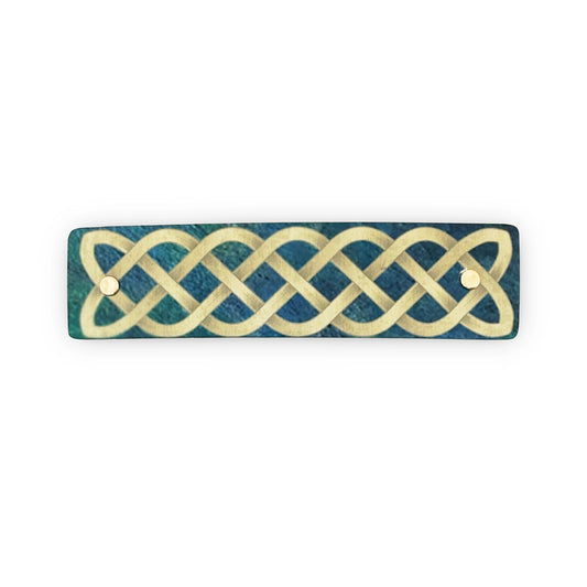 Medium French barrette hair clip, featuring a Celtic braid design on a shaded teal green background by Robbin V. Davis Studio.
