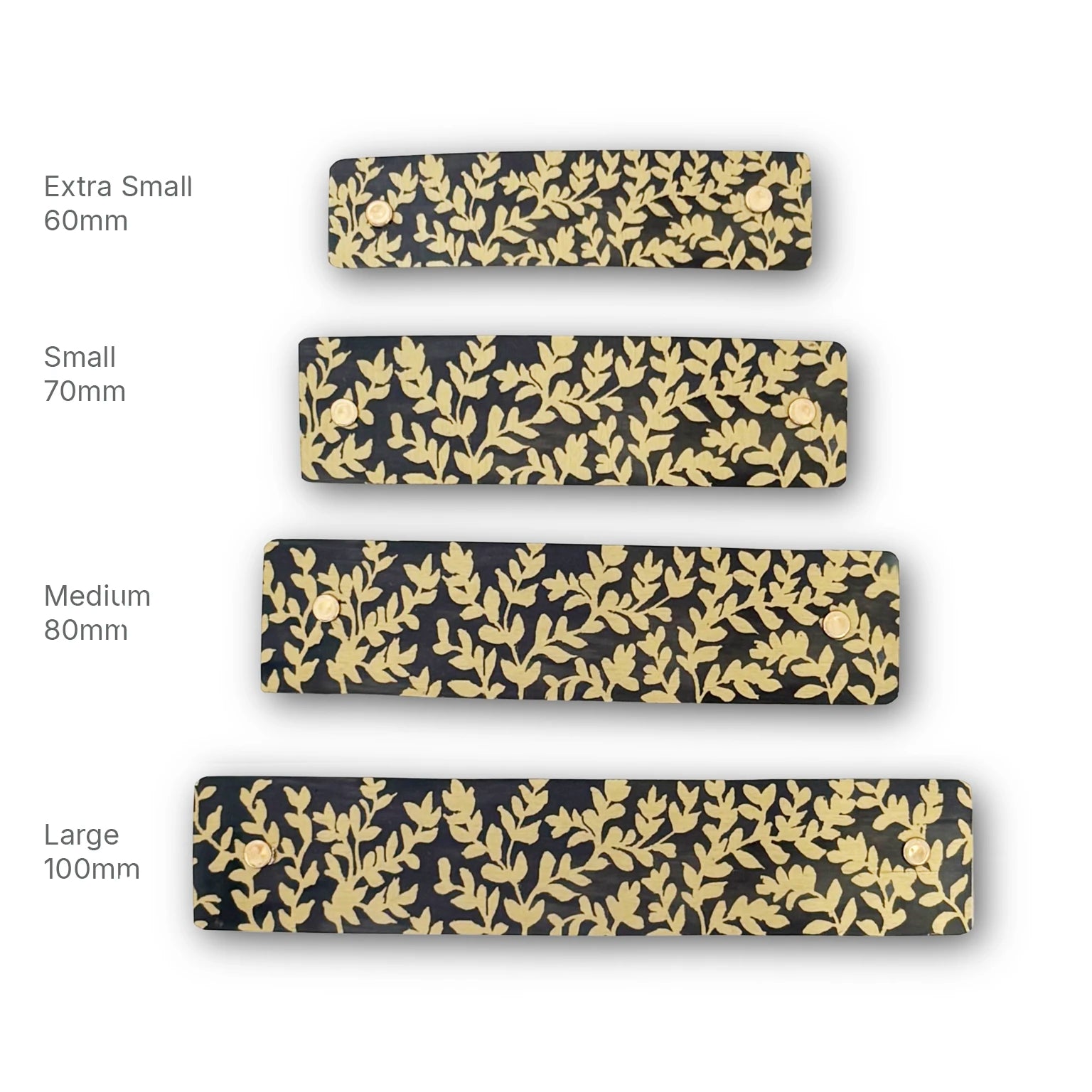 Four  boutique French barrettes  in different sizes (Extra Small 60mm, Small 70mm, Medium 80mm, Large 100mm) arranged vertically on a white background. Each barrette has a charcoal background with a repeating gold leaf pattern.