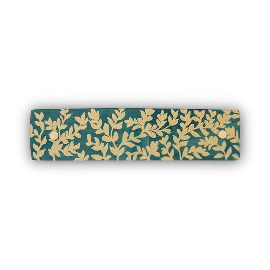 Botanical pattern hair clip in gold and green, handmade in North Carolina.