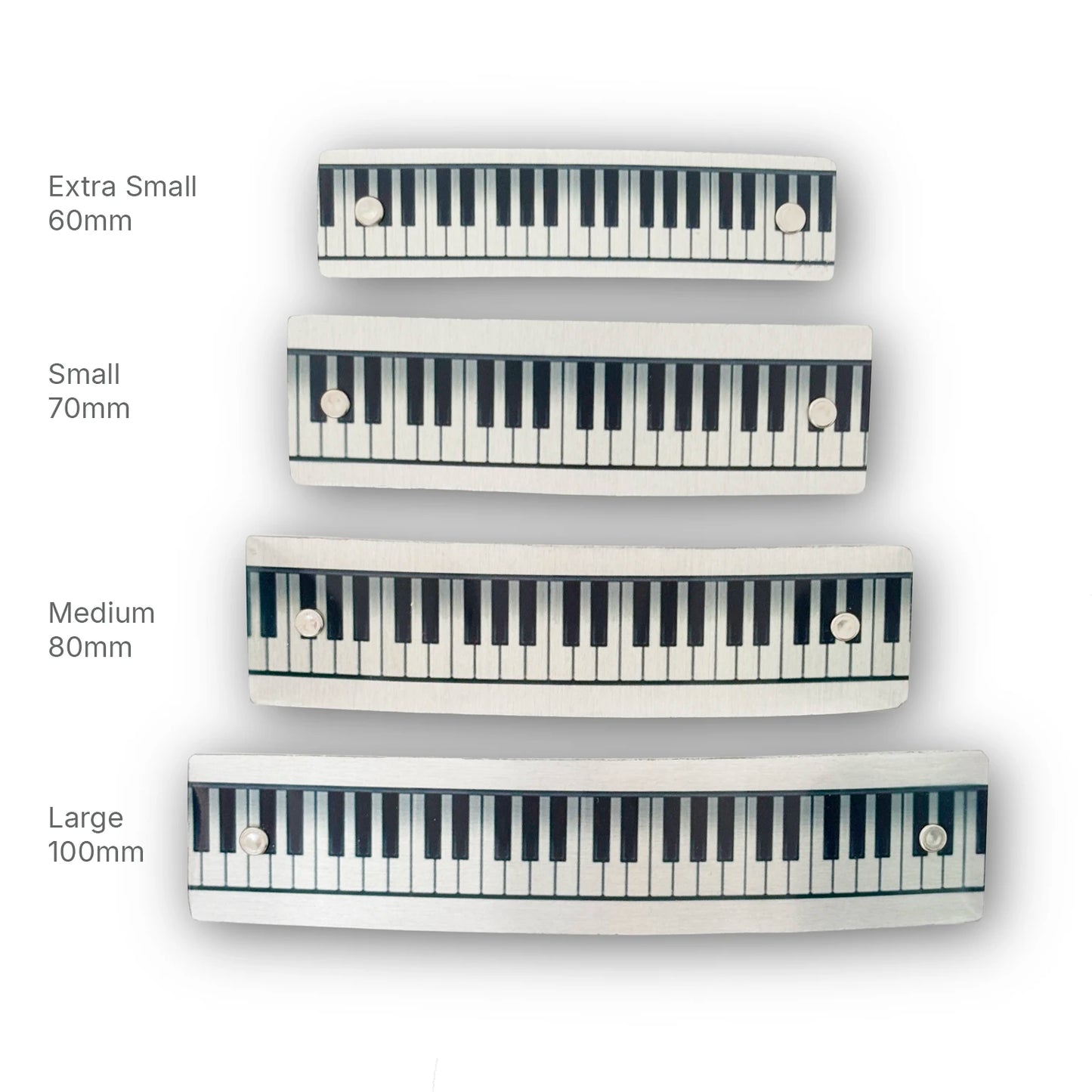Four piano-key style French barrettes, shown in four sizes labeled Extra Small 60mm, Small 70mm, Medium 80mm, and Large 100mm on a white background.